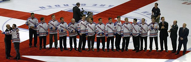 Messier (left foreground) during his number retirement ceremony with the New York Rangers. The ceremony was held in January 2006, several months after