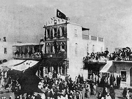 The Ottoman flag is raised during Mawlid celebrations in Benghazi in 1896.