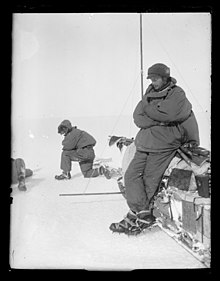 Mawson rests at the side of his sledge, Adelie Land, Antarctica, 1912. Mawson and sledge, Adelie Land, Antarctica, 1912.jpg