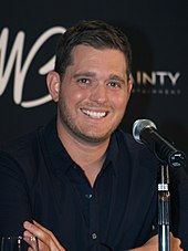 Michael Buble's Christmas was the last number-one album of the year, with four consecutive weeks atop the chart. MichaelBubleSmileeb2011.jpg