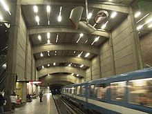 Metro train departing Montreal's Place-Saint-Henri Metro Station. Montreal-metro.jpg