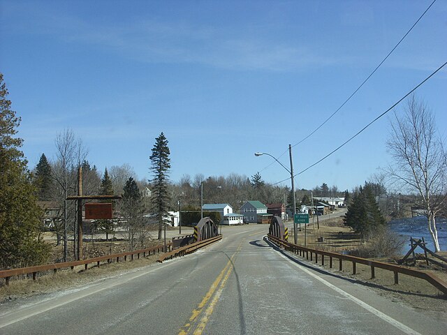 NY 458 eastbound entering the hamlet of St. Regis Falls