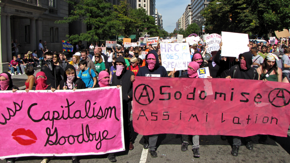 Queer anarchists protesting against homophobia, with a banner reading "Sodomize", on 11 October 2009 in Washington DC