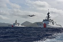 Midgett, an HC-130 search & rescue plane and USCGC Kimball (WMSL-756), sailing off Diamond Head, Hawaii, August 2019 Newest National Security Cutters meet up off Hawai'i's Diamond Head 190816-G-VB974-1061.jpg