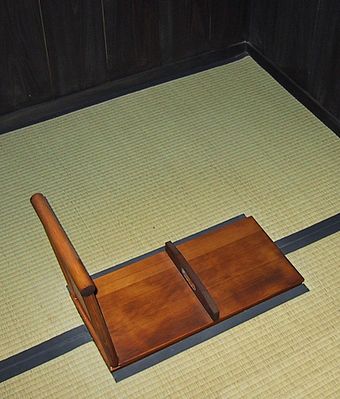 Wooden lid covering the Meiji Era squat toilet of a wealthy Japanese near Nakatsugawa.