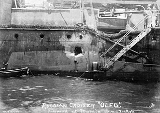 Battle damage to cruiser Oleg inflicted at the Battle of Tsushima. Photo taken June 1905 at Manila Bay. Oleg-cruiser.jpg