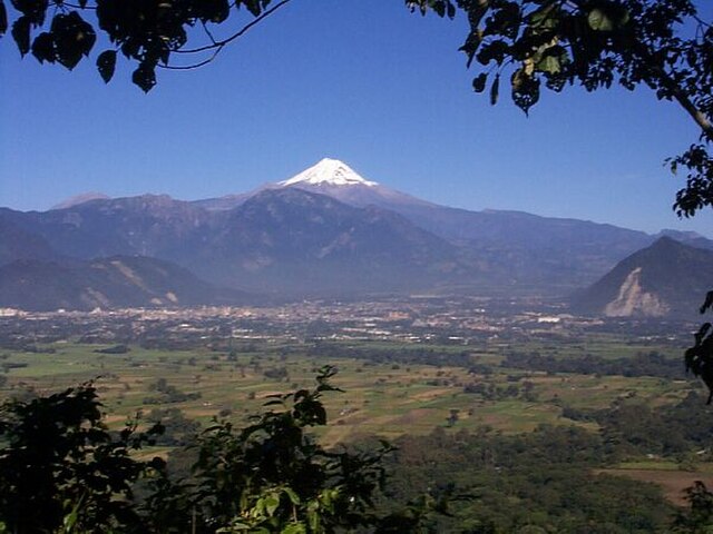 The Orizaba Valley Looking north, Orizaba in the middle distance, the Pico de Orizaba on the horizon