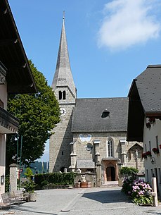 At the village square, in the background the parish church