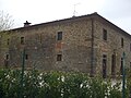 Vestiges de l'église paroissiale de San Pietro in Potentoro (plus tard à Monticello) incorporés dans une ferme aujourd'hui une auberge restaurant