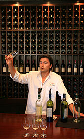 Torrontes wine tasting in Cafayate, Argentina Preparing a wine tasting flight at a tasting bar.jpg