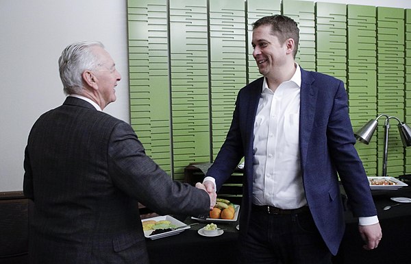 Manning and then Conservative Party leader Andrew Scheer in 2019