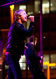 Kevin Truckenmiller singing for the first annual Revellution at UC San Diego