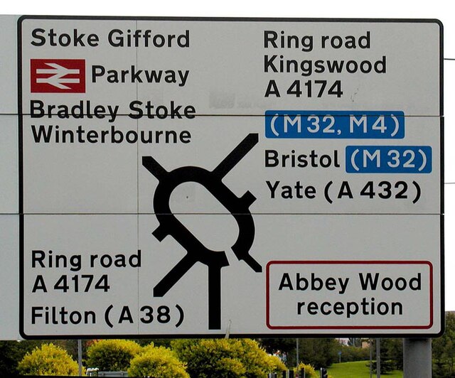 A road sign with the Transport typeface