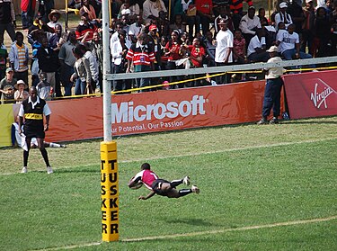 A Bristol University Select player scores a try at the 2008 Safari Sevens, at the RFUEA Ground Safarisevens diving try.jpg