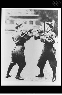 2 women boxing in the 1904 Olympics in St. Louis.