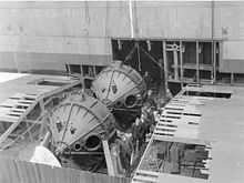 Two 25-ton roll-stabilizing gyroscopes being installed on the transport USS Henderson during construction in 1917, the first large ship to use gyroscopic stabilization Ship stabilizing gyroscopes USS Henderson 1917.jpg