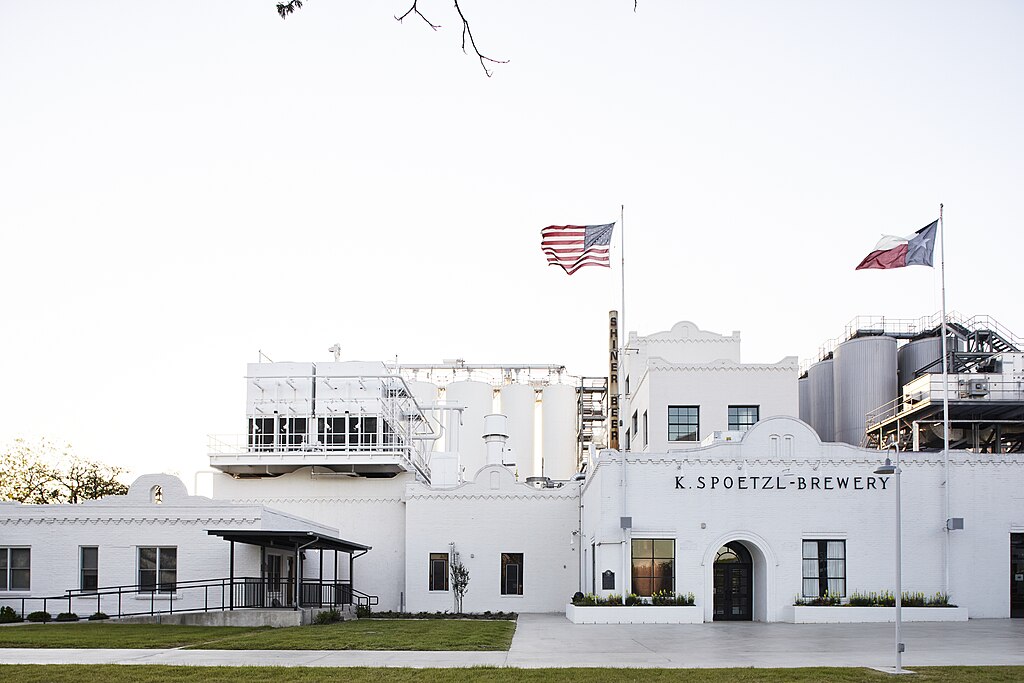 exterior of white Spoetzl Brewery in shiner texas