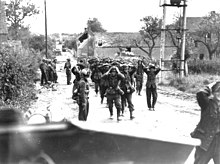 German forces surrendering in St. Lambert-sur-Dives on 21 August 1944 St.-Lambert-surrender.jpg