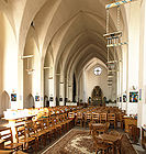 Looking eastwards from the creche. Note how the obverse of the Gill Calvary forms the tracery of the east window.