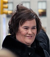 During her audition, the Kathy Geiss character sings in the style of singer Susan Boyle (pictured). Susan Boyle Nov 2009.jpg