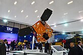 Макет військового розвідувального супутника Göktürk-2 на стенді TAI на виставці IDEF 2015