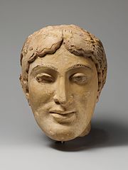 Terracotta head of a woman, probably a sphinx