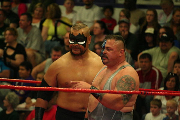 Barbarian (left) with Buz at an independent event in 2013