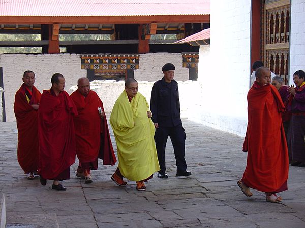 The Je Khenpo in 2010, at Punakha Dzong, in a saffron kabney