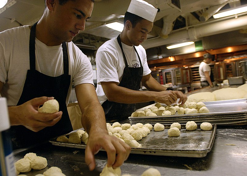 File:US Navy 051115-N-9742R-008 Airman Alberto Mata and Seaman Michael Perez prepare dough to be baked into dinner rolls in the bakery aboard the nuclear-powered aircraft carrier USS Enterprises (CVN 65).jpg