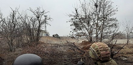 Ukrainian soldiers attack a Russian tank in Mariupol