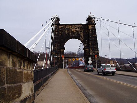 The Wheeling Suspension Bridge across the Ohio River was completed in 1849 and was still in use by local traffic until its closure on September 24, 2019. The bridge is now limited to pedestrians only.