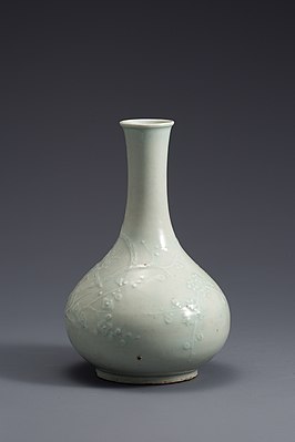 White Porcelain Bottle with Plum and Bird Design in Relief