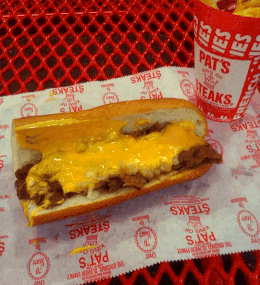 A cheesesteak sandwich with Cheez Whiz