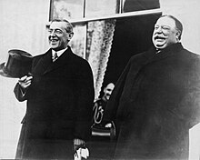 Taft with Woodrow Wilson prior to the latter's inauguration. March 4, 1913. WilsonTaftLaughing (cropped).jpg