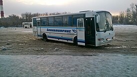 КАвЗ-4238 «Аврора» Салаватского автотранспортного предприятия. В 2014 году Ишимбайское АТП вошло в состав Салаватского АТП. На заднем плане — ПАЗ-320302