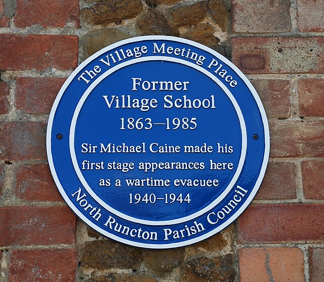 Blue plaque at the former school in North Runcton where, as a wartime evacuee, Caine made his stage debut