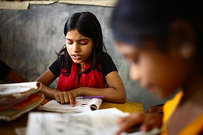 10 years old Dipa and 12 years old Laboni study in class 2 at "Unique Child learning Center", Mirmur-Dhaka, Bangladesh.