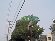 In a numbered grid system, adding an extra street can cause confusion 13 1/2 Street.jpg