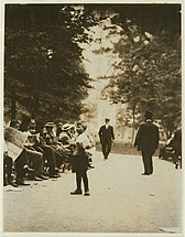 Boy selling newspapers in Union Square, July 1910