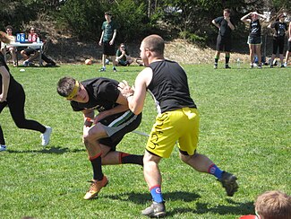 Seeker (l) and Snitch (r) at King's Cup Quidditch Tournament, Syracuse University, April 2015 2015 King's Cup Quidditch Tournament, Syracuse, NY-04.JPG