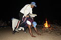 Trainee climbers performing during campfire