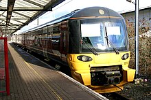A Class 333 unit on platform 1 333002 at Bradford Forster Square.jpg