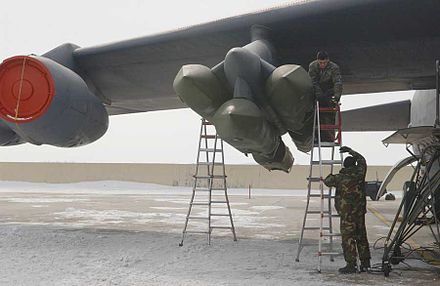 AGM-129 ACM being secured on a B-52H bomber