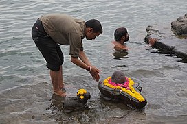 A river and decorated Shiva linga pooja, Hindu rituals.jpg