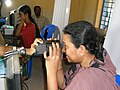 collecting image of iris for Aadhaar,a 12-digit unique number which the Unique Identification Authority of India (UIDAI) will issue for all residents in India.The number will be stored in a centralized database and linked to the basic demographics and biometric information – photograph, ten fingerprints and iris of each individual.