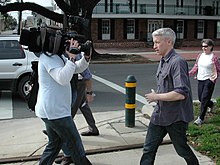 Cooper covering a 2007 protest of the government response to Hurricane Katrina