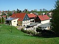 Residential stable house and barn with attached side building of a farm