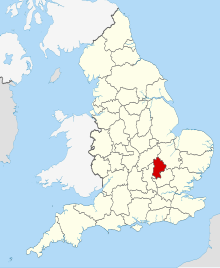 A small county slightly to the south and east of the centre of the country, and completely bounded by other counties.