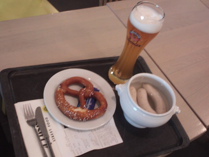 File:Beer pretzel and weisswurst at MUC.jpg