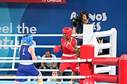 Deutsch: Boxen bei den Olympischen Jugendspielen 2018 Tag 12, 18. Oktober 2018 - Finale Fliegengewicht Mädchen – Martina La Piana (Italien, blau) schlägt Adijat Gbadamosi (Nigeria, rot) 5-0; Ringrichter ist James Beckles (Trinidad und Tobago). English: Boxing at the 2018 Summer Youth Olympics on 18 October 2018 – Girl's flyweight Gold Medal Bout - Martina La Piana (Italy, blue) beats Adijat Gbadamosi (Nigeria, red) 5-0; Referee is James Beckles (Trinidad and Tobago). Español: Boxeo en los Juegos Olímpicos Juveniles de Verano de 2018 en 18 de octubre de 2018 - Combate a medalla de oro de peso mosca para mujeres: Martina La Piana (Italia, azul) le gana a Adijat Gbadamosi (Nigeria, roja) 5-0; El árbitro es James Beckles (Trinidad y Tobago).